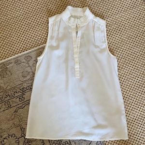 J.Crew cream colored sleeveless blouse with ruffle neck
